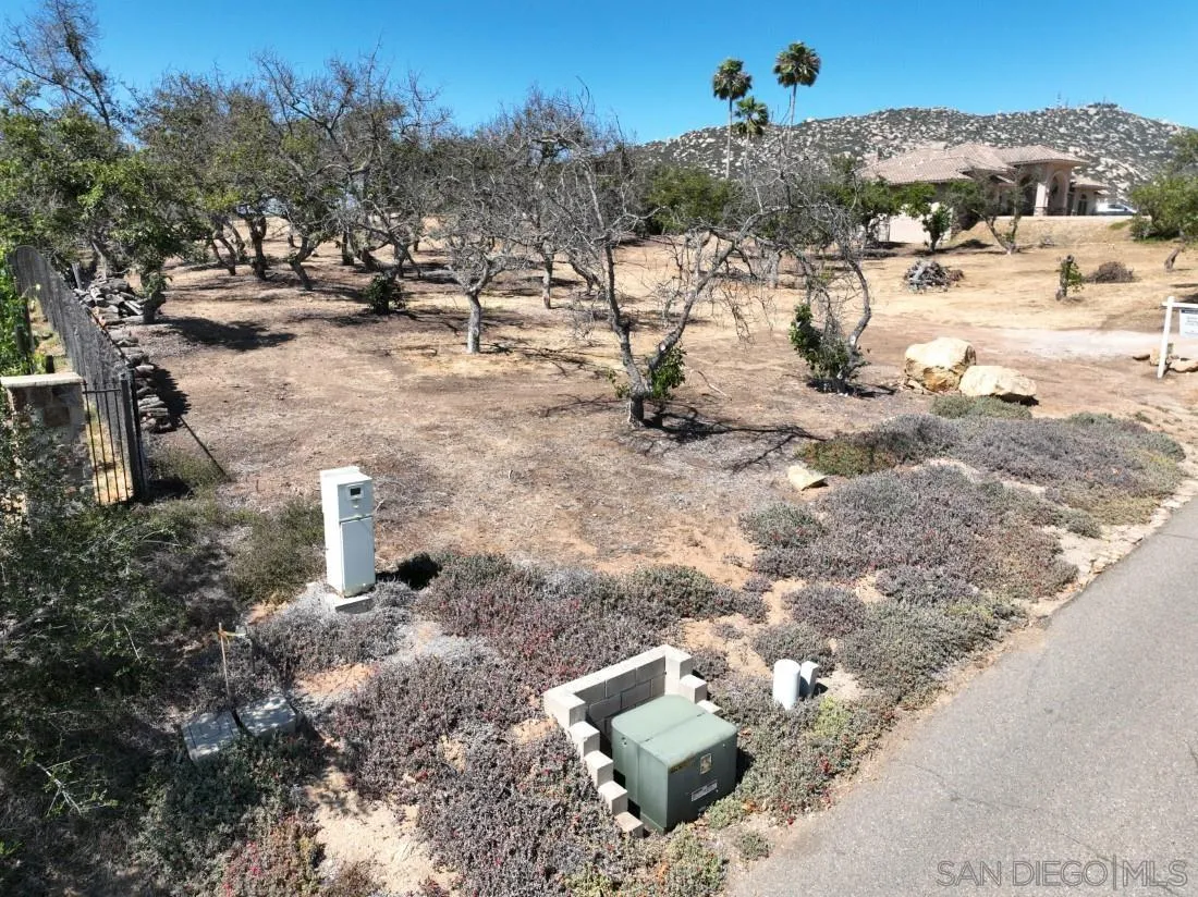 2 Skyridge Road, Unit 2 Poway, CA 92064 - Photo 12 of 13 a view of a fire pit with large trees