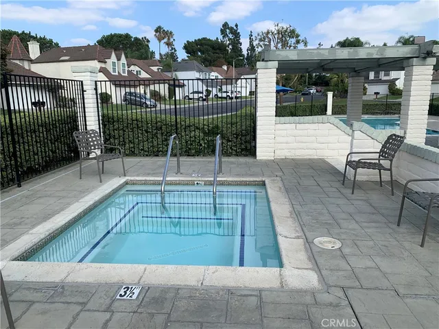 a view of a house with backyard and porch