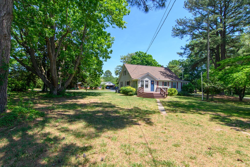 24432 Maxwell Street Parksley, VA 23421 - Photo 32 of 39 a view of a house with a big yard