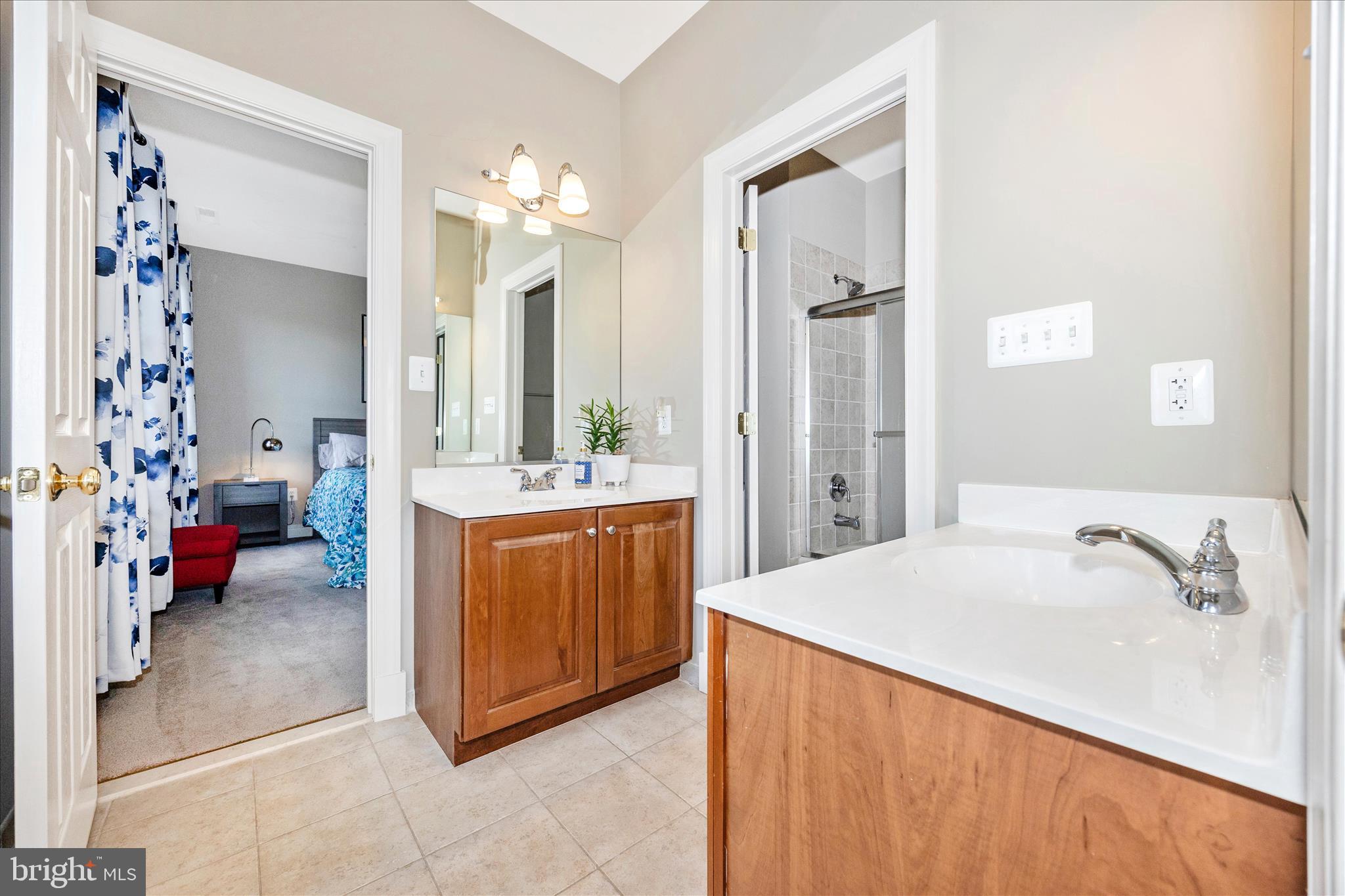 14746 New Windsor Road New Windsor, MD 21776 - Photo 31 of 67 a spacious bathroom with a tub sink and mirror