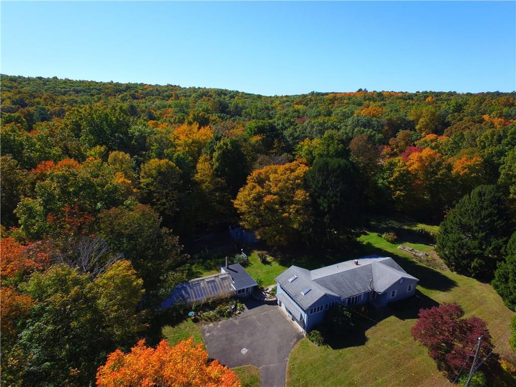 8 Bailey Road Andover, CT 06232 - Photo 1 of 1 From above you can better appreciate the gorgeous grounds on which this home, greenhouse and barn are situated.