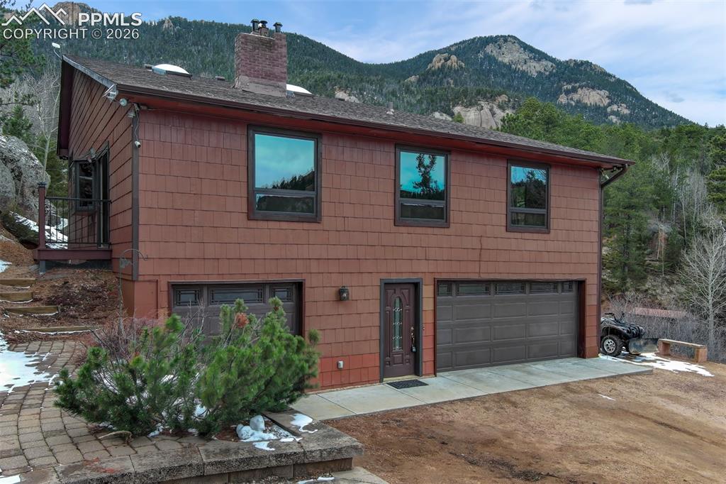 5865 Waterfall Loop Manitou Springs, CO 80829 - Photo 2 of 45 Closer view of the front of the home