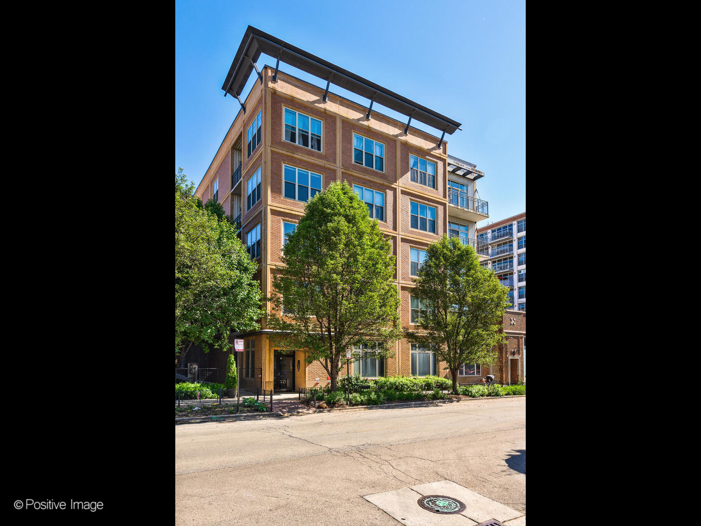 1228 West Monroe Street, Unit 408 Chicago, IL 60607 - Photo 1 of 17 a front view of a building