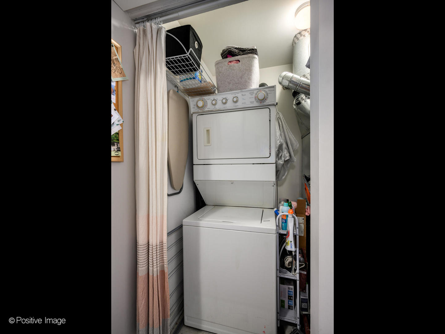 1228 West Monroe Street, Unit 408 Chicago, IL 60607 - Photo 17 of 17 a utility room with dryer and washer