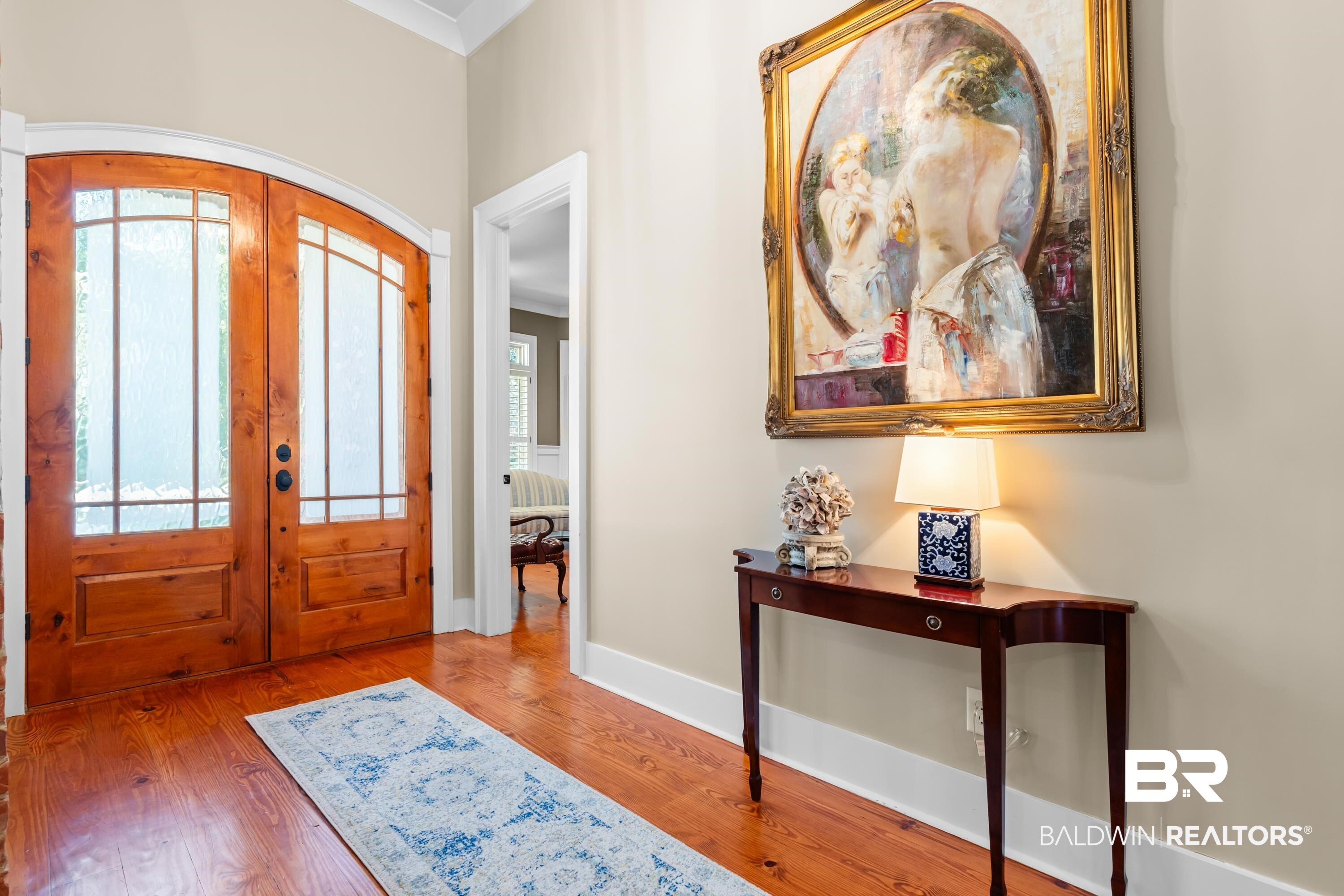 30057 Dolive Ridge Daphne, AL 36527 - Photo 4 of 55 Entrance foyer with french doors, ornamental molding, and light hardwood / wood-style floors