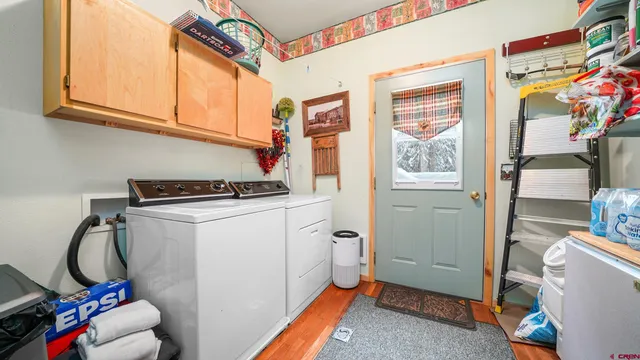 a bathroom with a tub and a sink