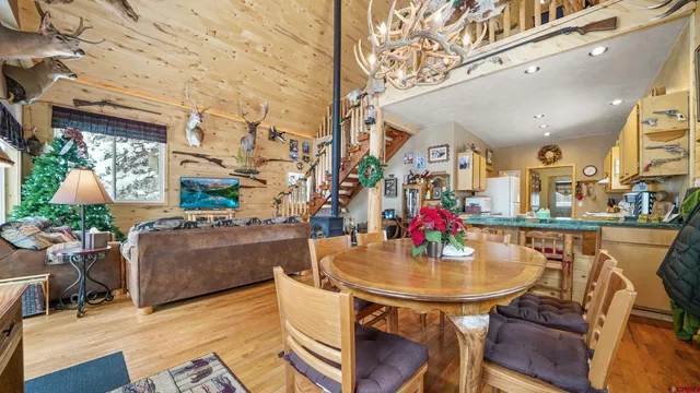 a kitchen with stainless steel appliances granite countertop a refrigerator and stove