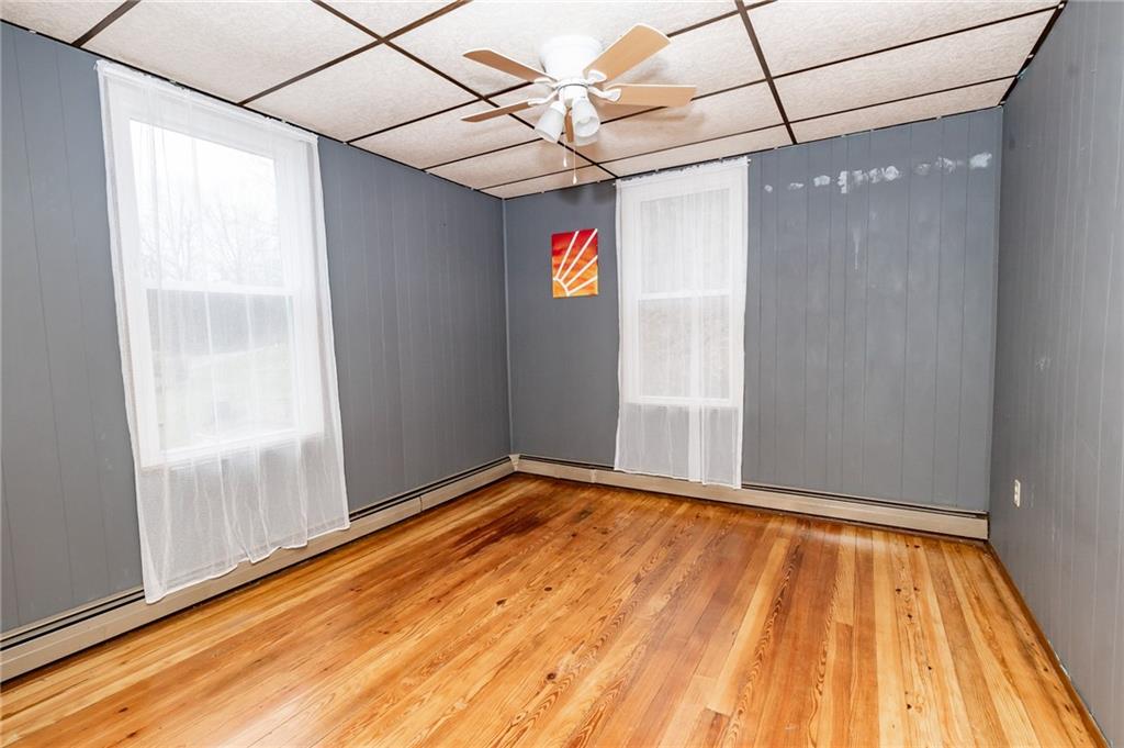 755 Morris Street Clymer, PA 15728 - Photo 13 of 22 a view of empty room with wooden floor