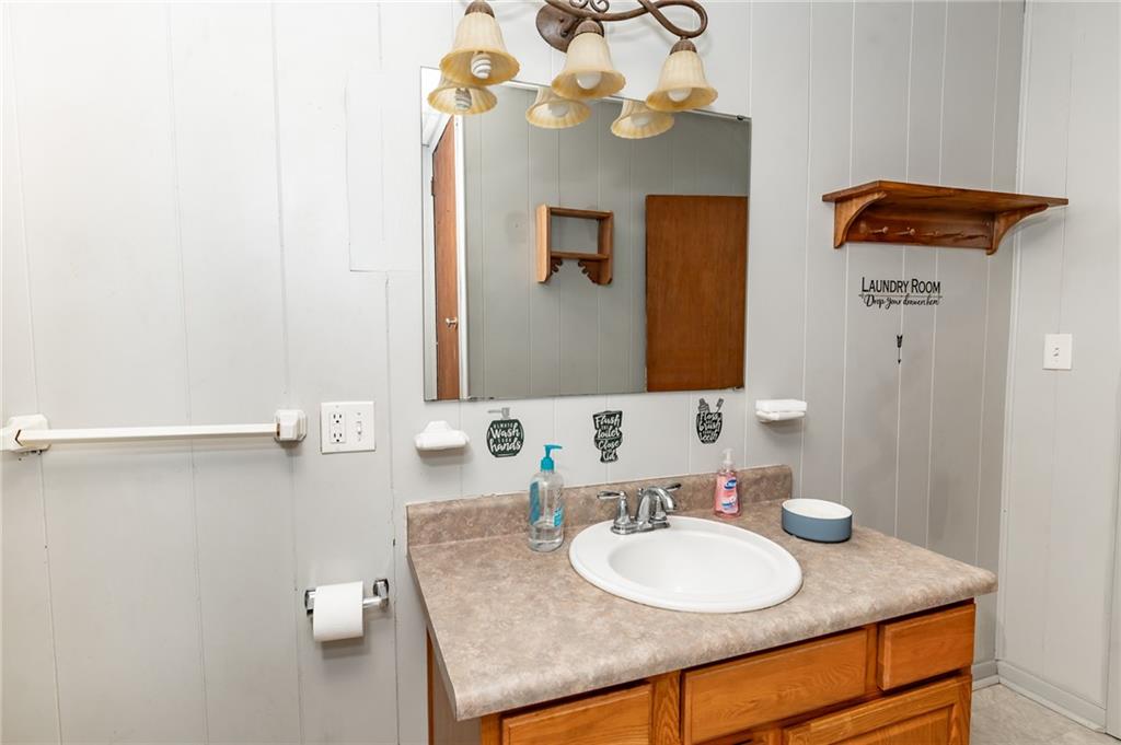755 Morris Street Clymer, PA 15728 - Photo 19 of 22 a bathroom with a sink vanity and mirror