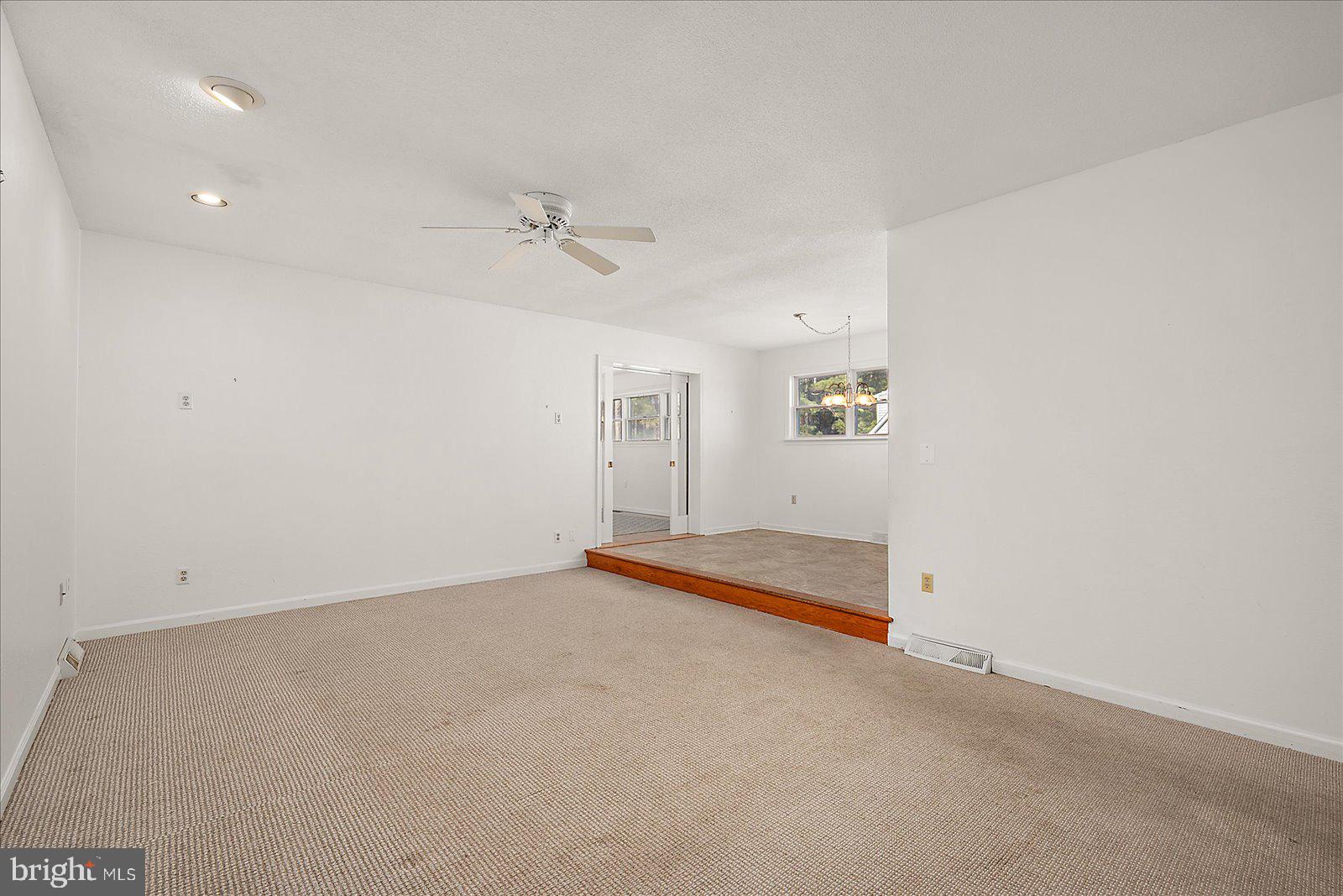 10505 Keyser Point Road Ocean City, MD 21842 - Photo 11 of 53 an empty room with a empty space and windows