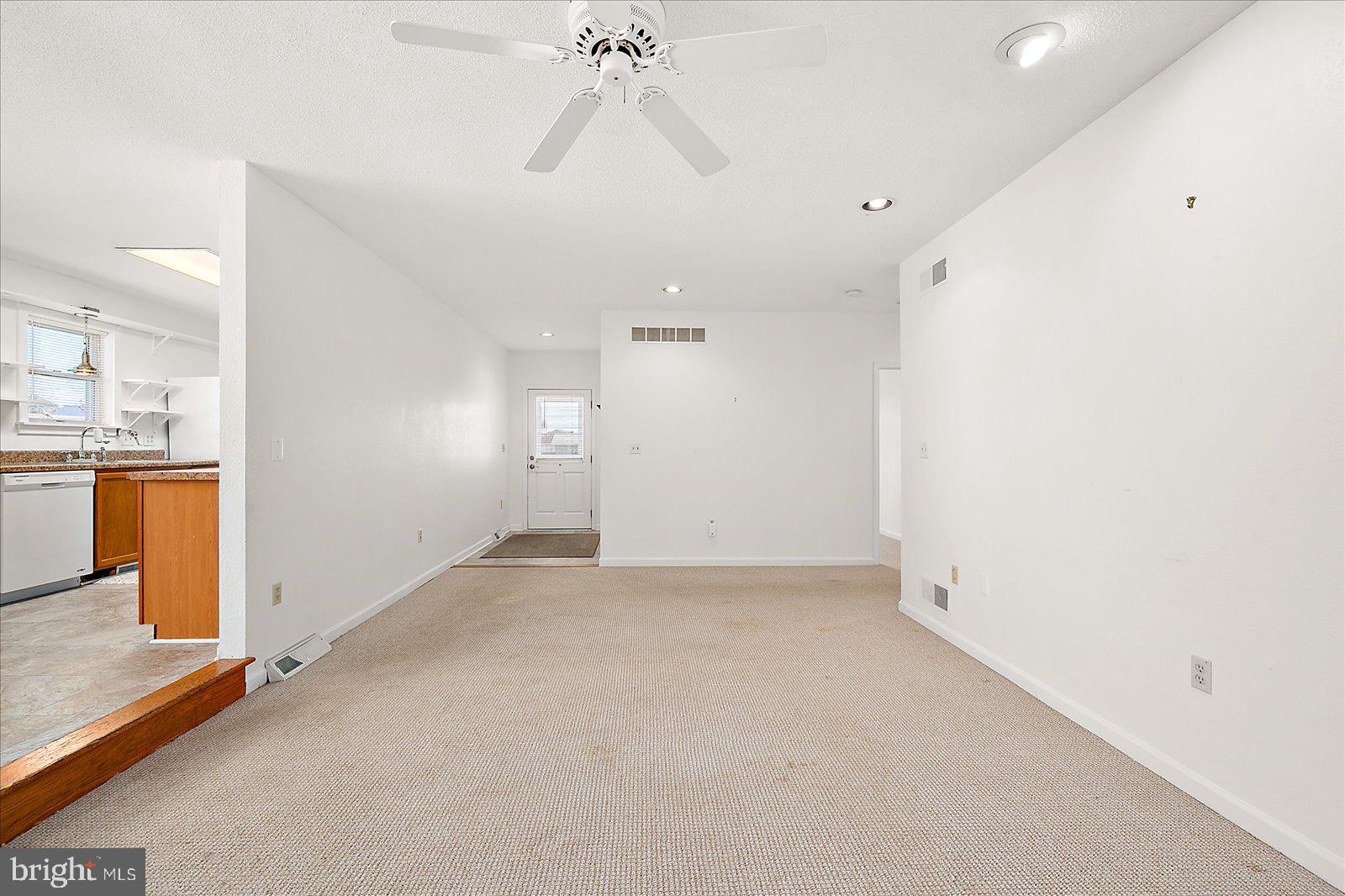 10505 Keyser Point Road Ocean City, MD 21842 - Photo 13 of 53 an empty room with a empty space and windows