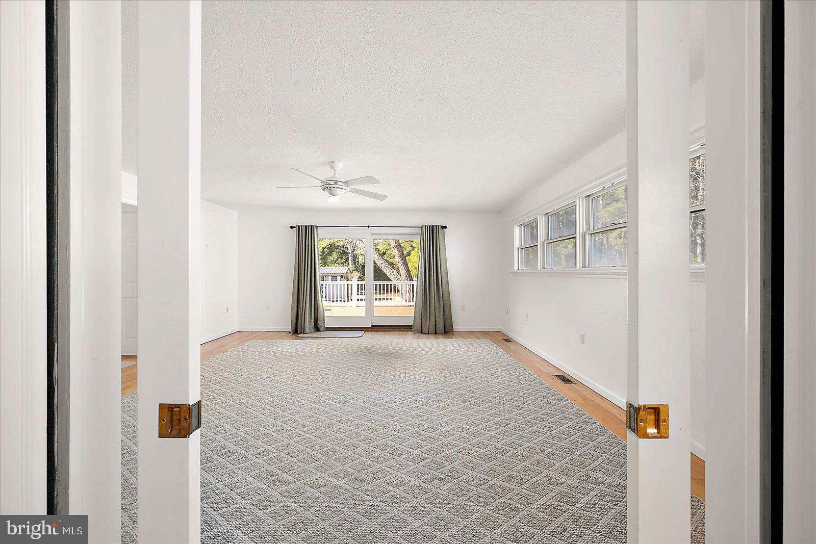 10505 Keyser Point Road Ocean City, MD 21842 - Photo 22 of 53 a view of an empty room with a window