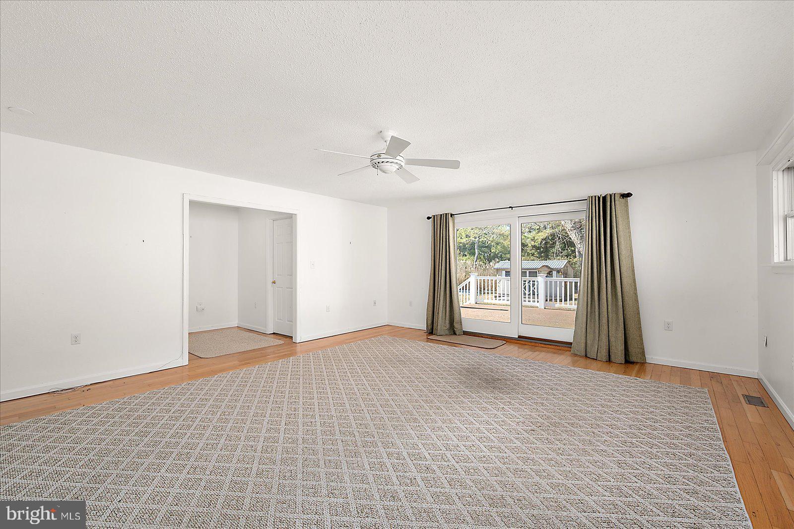 10505 Keyser Point Road Ocean City, MD 21842 - Photo 23 of 53 a view of an empty room with a window