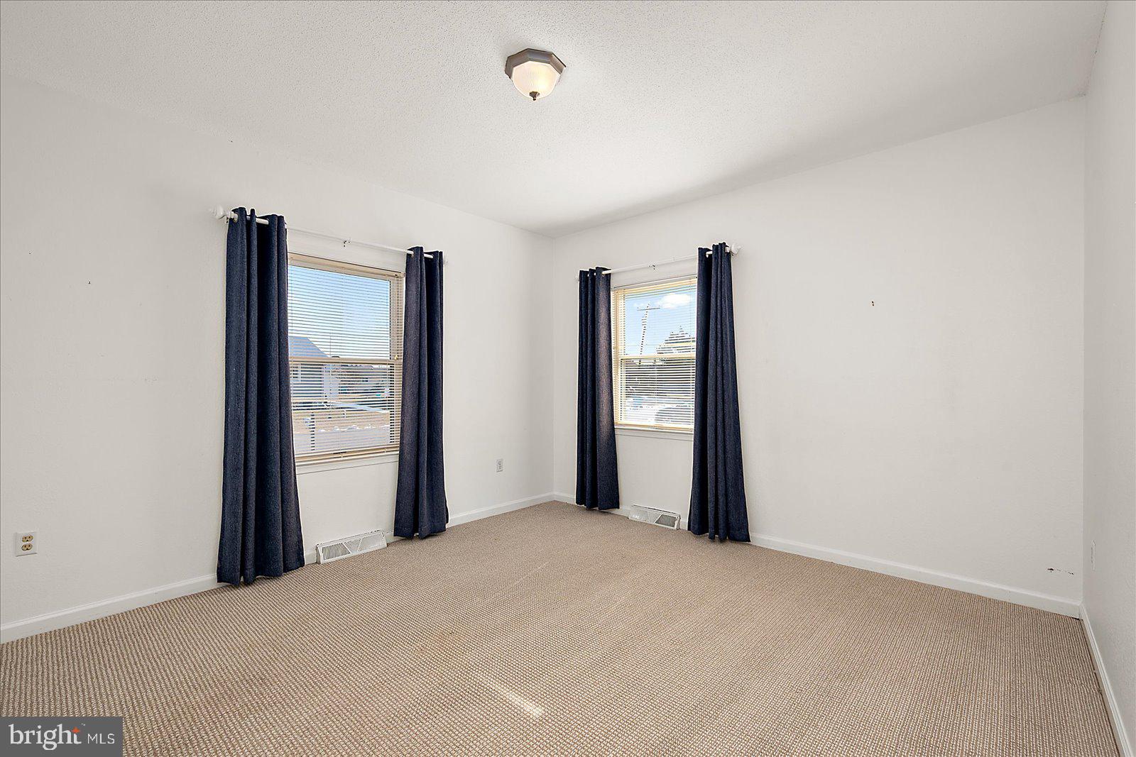 10505 Keyser Point Road Ocean City, MD 21842 - Photo 35 of 53 a view of a room with closet and large window