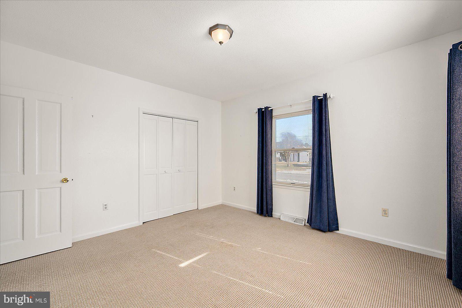 10505 Keyser Point Road Ocean City, MD 21842 - Photo 36 of 53 an empty room with large window