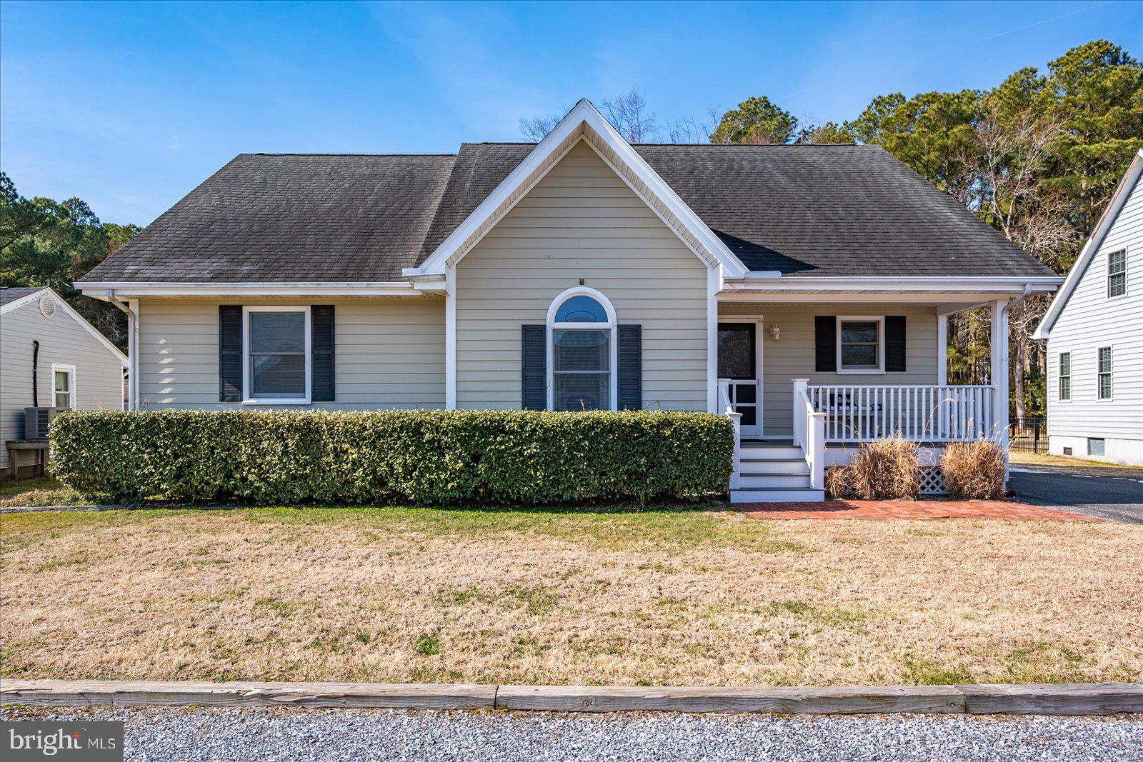 10505 Keyser Point Road Ocean City, MD 21842 - Photo 52 of 53 a front view of a house with a yard