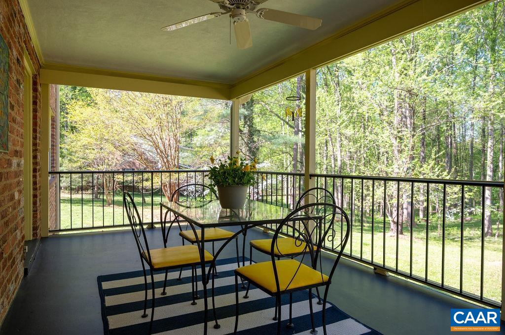 920 Flordon Drive Charlottesville, VA 22901 - Photo 12 of 43 a view of a porch with furniture and wooden floor