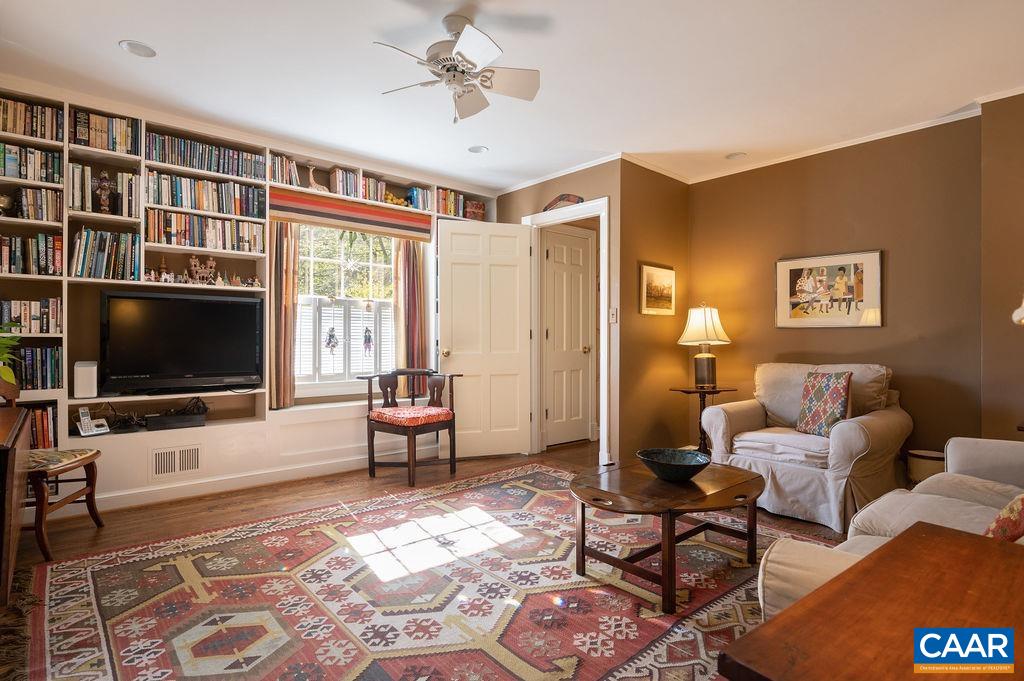 920 Flordon Drive Charlottesville, VA 22901 - Photo 13 of 43 a living room with furniture and a flat screen tv