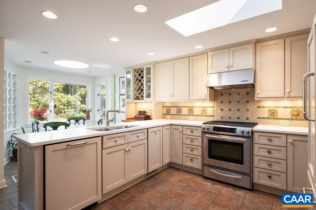 920 Flordon Drive Charlottesville, VA 22901 - Photo 17 of 43 a kitchen with a sink stove and cabinets