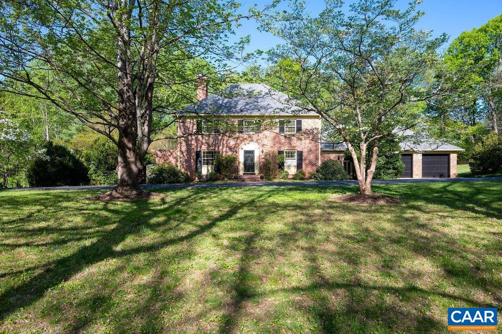 920 Flordon Drive Charlottesville, VA 22901 - Photo 2 of 43 a front view of a house with a yard
