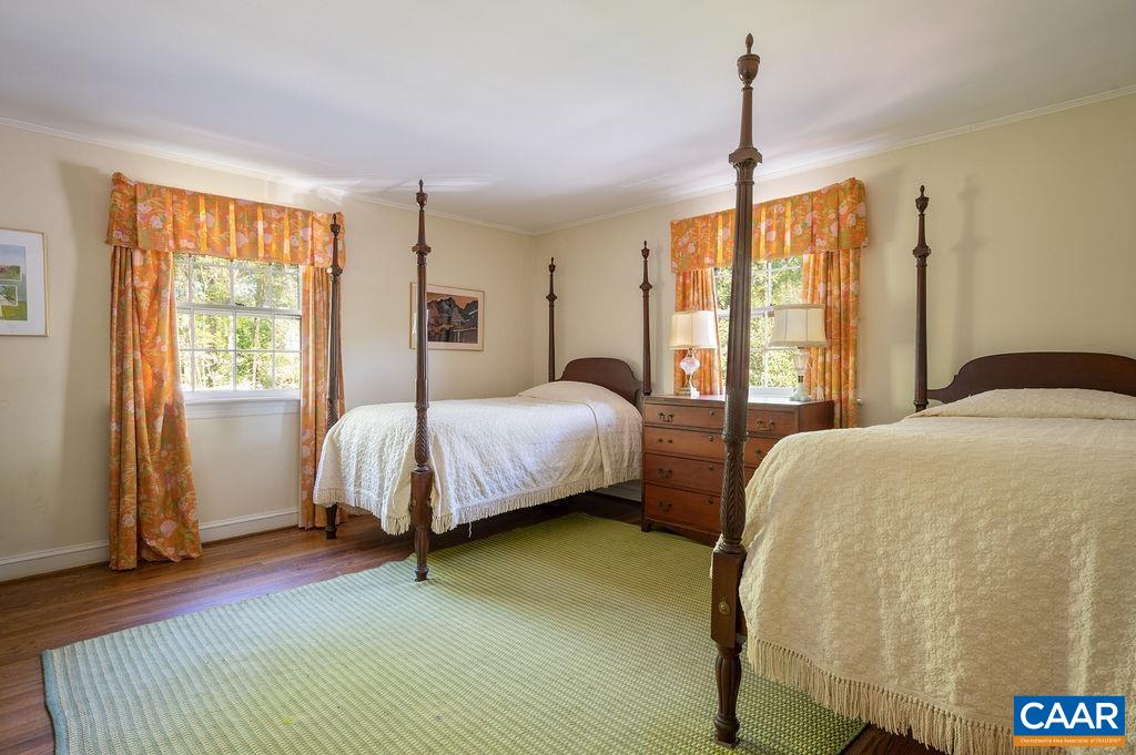 920 Flordon Drive Charlottesville, VA 22901 - Photo 23 of 43 a bedroom with a bed wooden floor and window