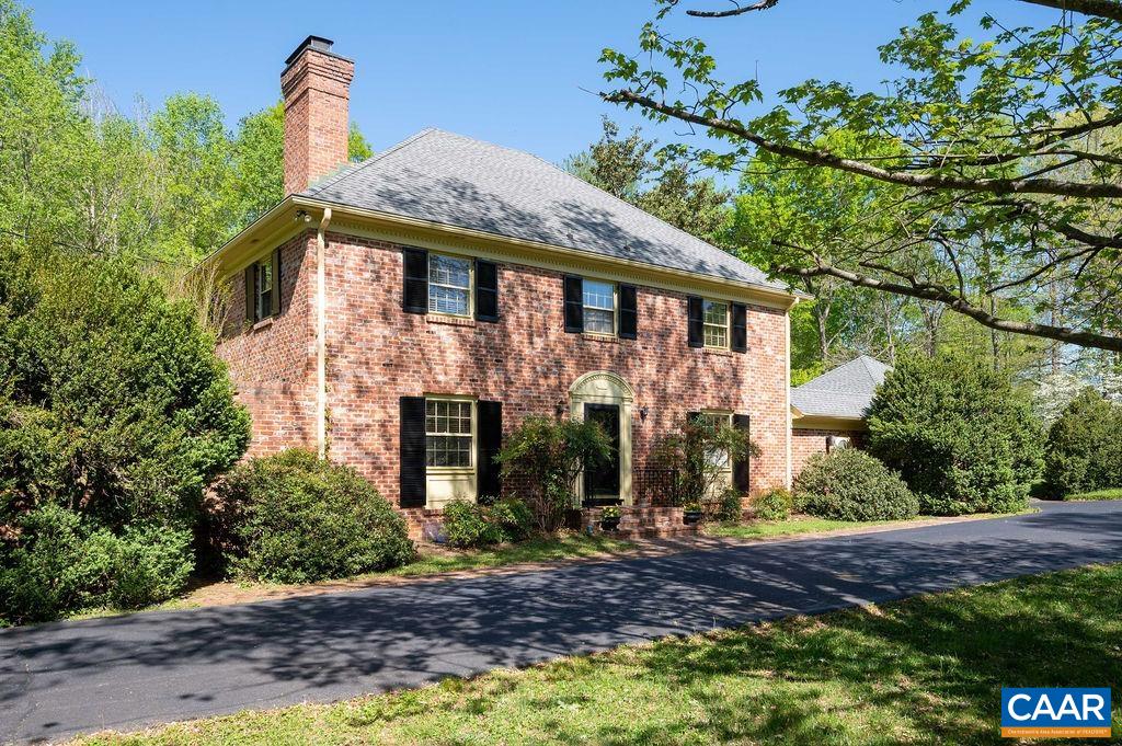 920 Flordon Drive Charlottesville, VA 22901 - Photo 3 of 43 a front view of a house with garden