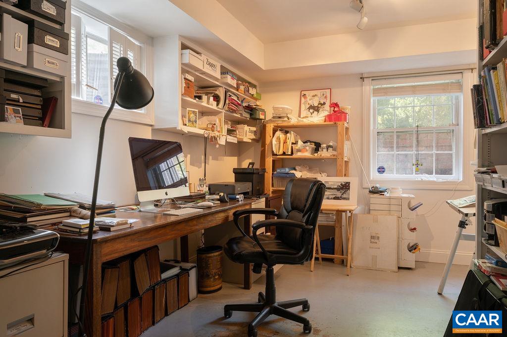 920 Flordon Drive Charlottesville, VA 22901 - Photo 32 of 43 a view of a workspace with furniture and a window