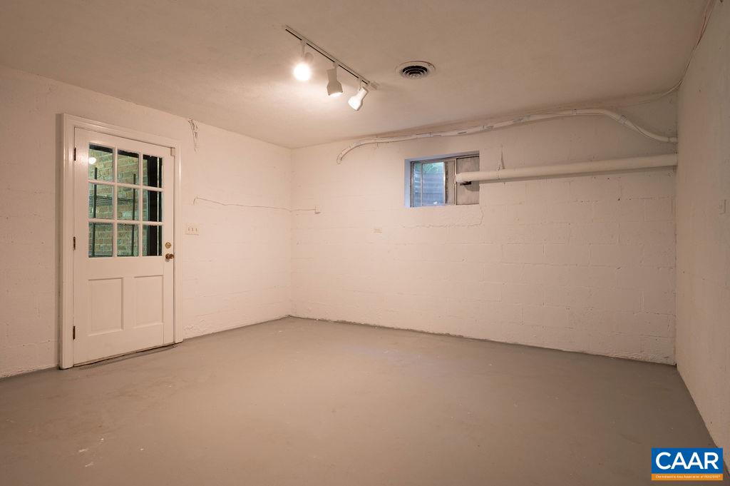 920 Flordon Drive Charlottesville, VA 22901 - Photo 33 of 43 an empty room with windows