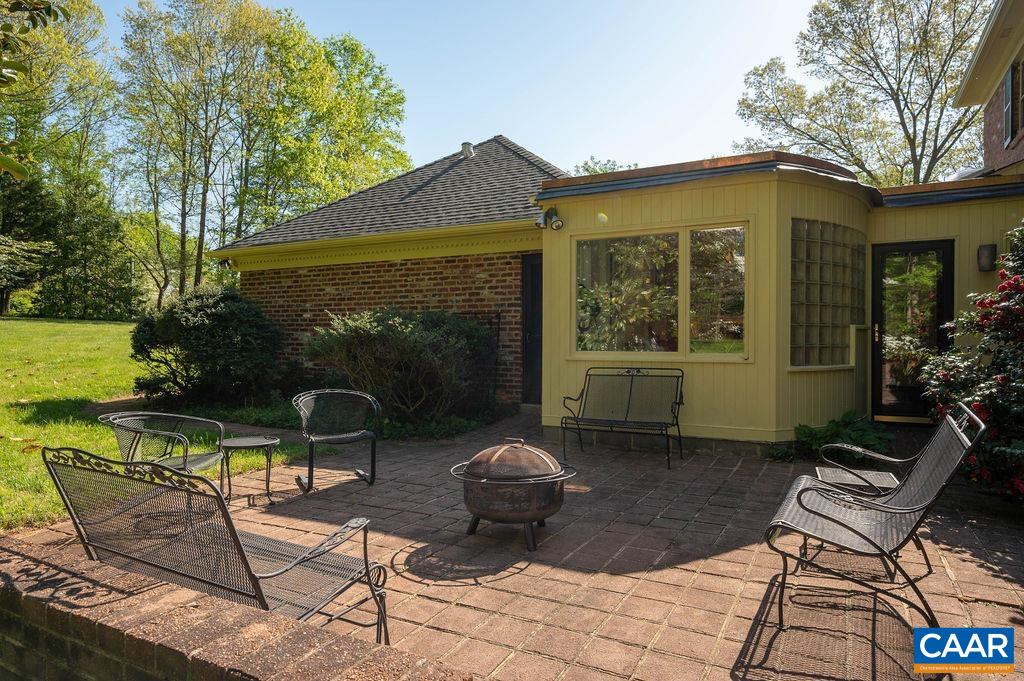 920 Flordon Drive Charlottesville, VA 22901 - Photo 36 of 43 a view of a chair and table in backyard of the house