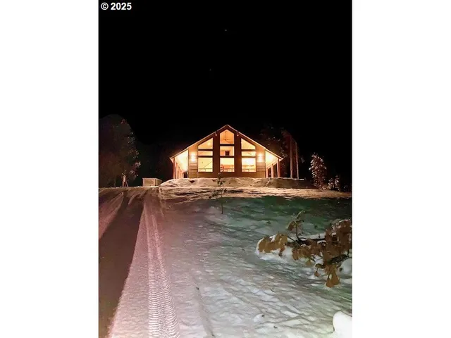 a view of swimming pool from a balcony