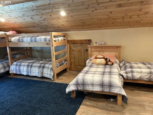 a bedroom with bed and a window