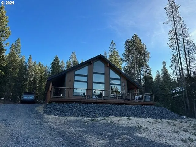 a house with trees in the background