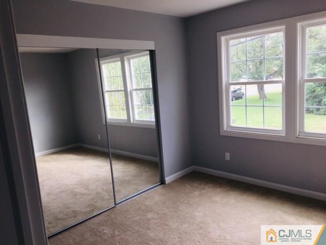 65 Old Post Road Edison, NJ 08817 - Photo 12 of 25 an empty room with windows