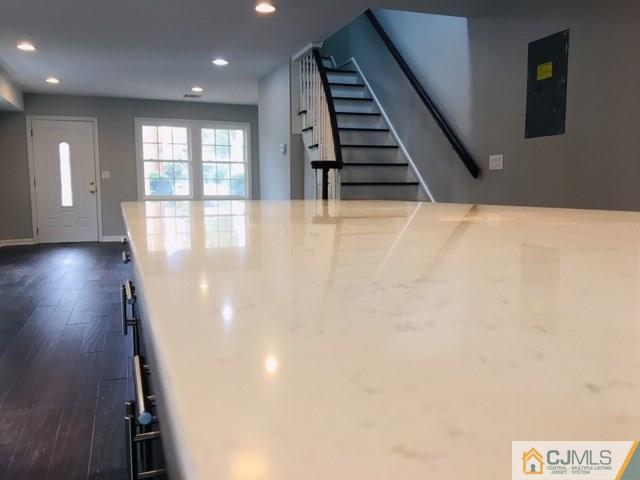 65 Old Post Road Edison, NJ 08817 - Photo 6 of 25 an entryway in a hall with a window