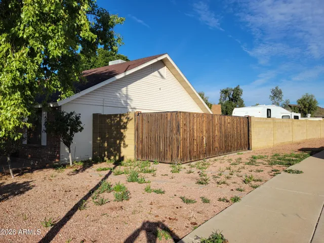 a front view of house with a yard