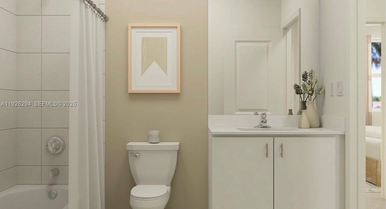 2538 Southeast 29th Street Homestead, FL 33035 - Photo 3 of 9 a bathroom with a toilet sink and mirror