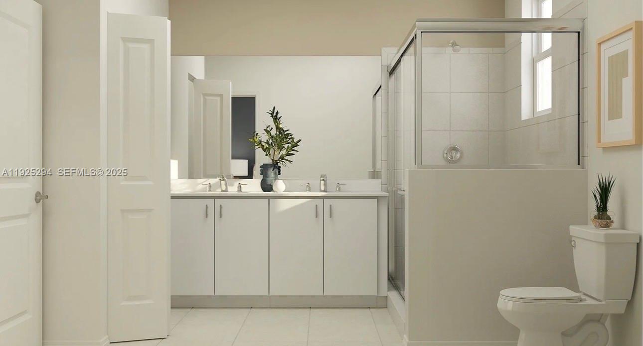 2538 Southeast 29th Street Homestead, FL 33035 - Photo 4 of 9 a bathroom with a shower a toilet and sink