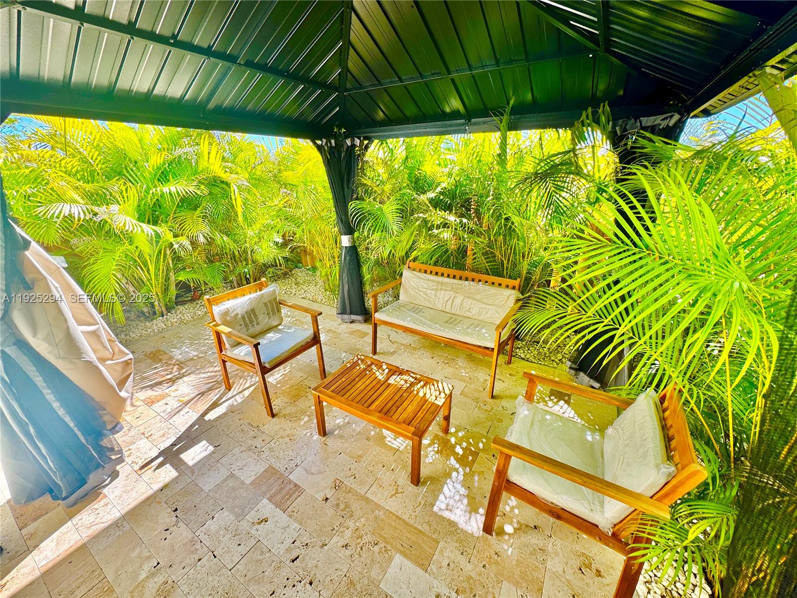 2538 Southeast 29th Street Homestead, FL 33035 - Photo 7 of 9 a view of an outdoor space with seating area