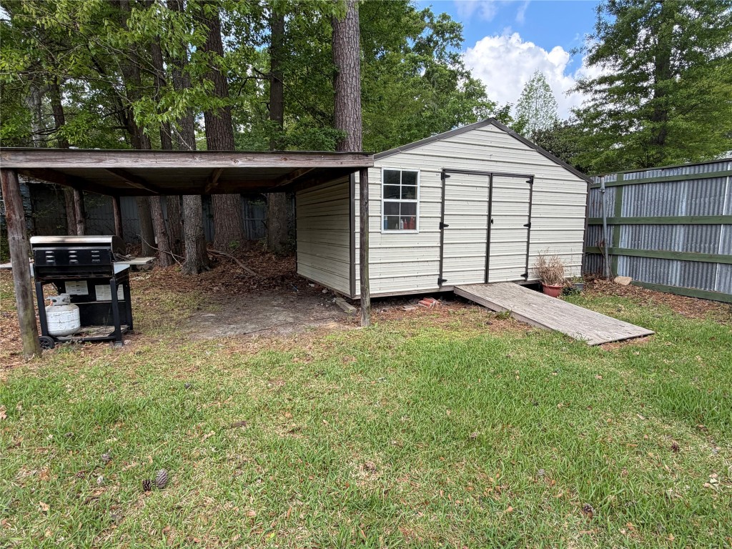 114 Elm Branch Street Huntington, TX 75949 - Photo 11 of 14 a front view of a house with a yard