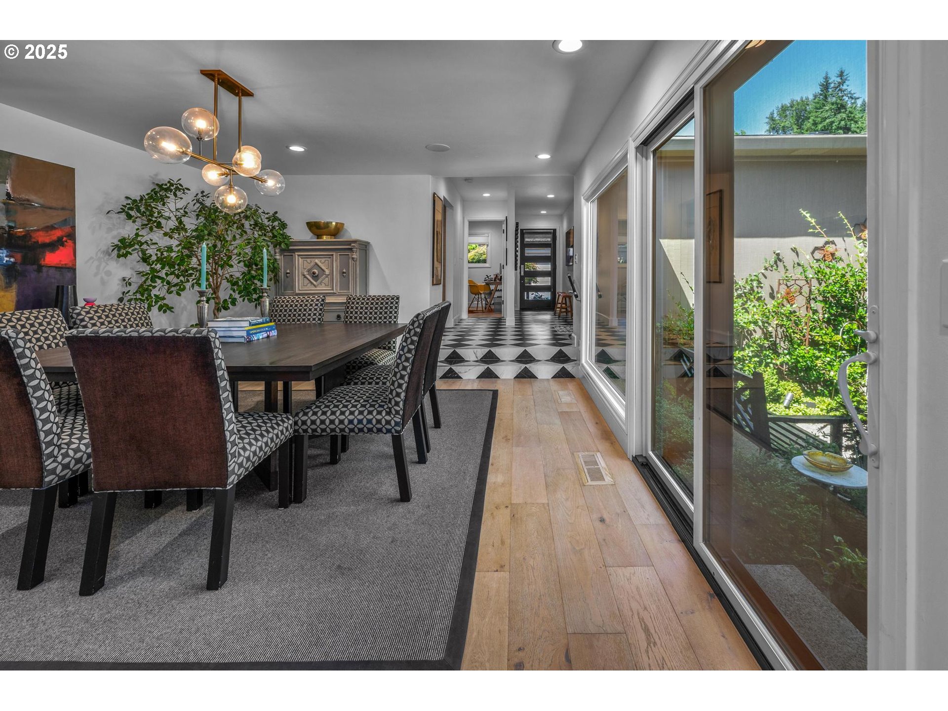 40 Southwest Condolea Court Lake Oswego, OR 97035 - Photo 12 of 39 a dining room with furniture and wooden floor