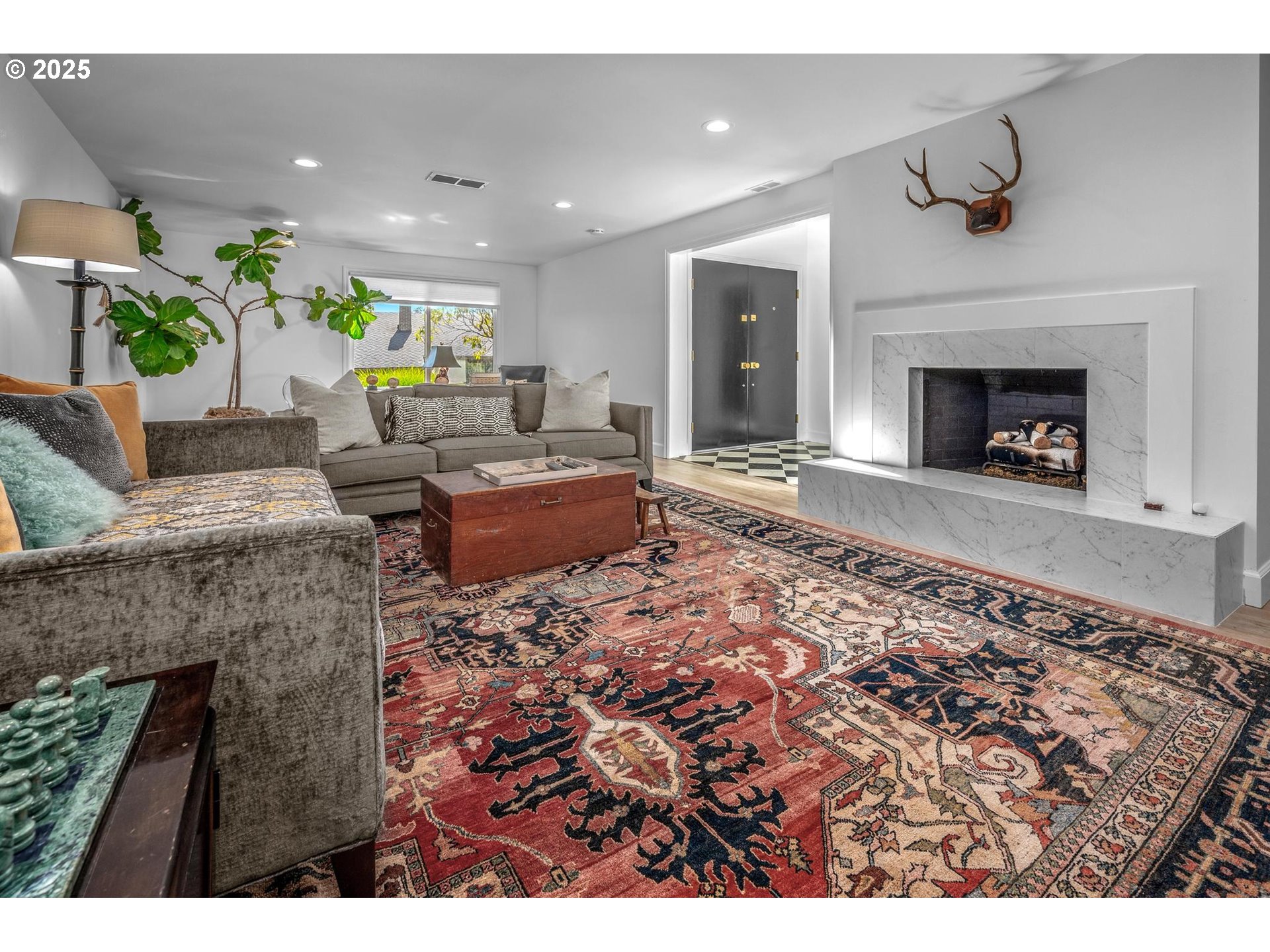 40 Southwest Condolea Court Lake Oswego, OR 97035 - Photo 16 of 39 a living room with furniture and a fireplace