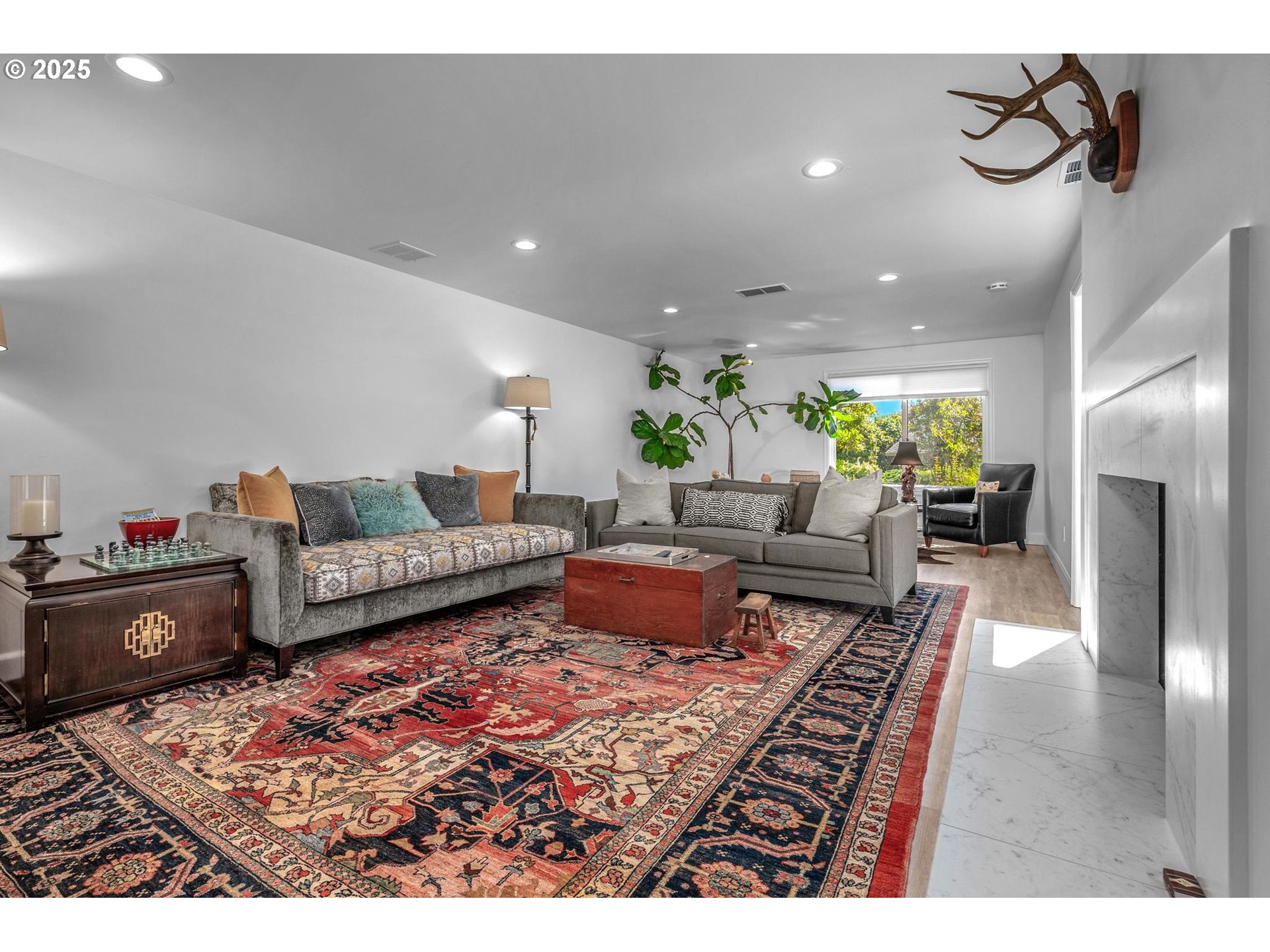 40 Southwest Condolea Court Lake Oswego, OR 97035 - Photo 17 of 39 a living room with furniture and a rug