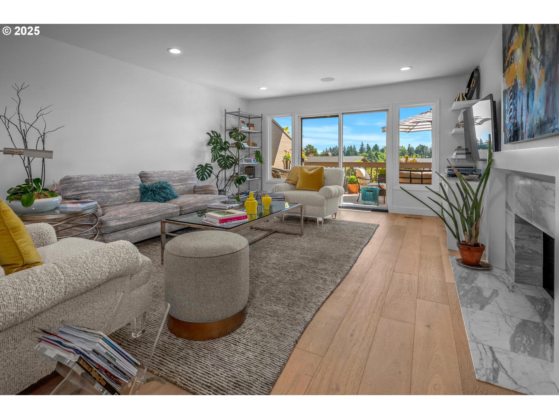 40 Southwest Condolea Court Lake Oswego, OR 97035 - Photo 2 of 39 a living room with furniture and a flat screen tv