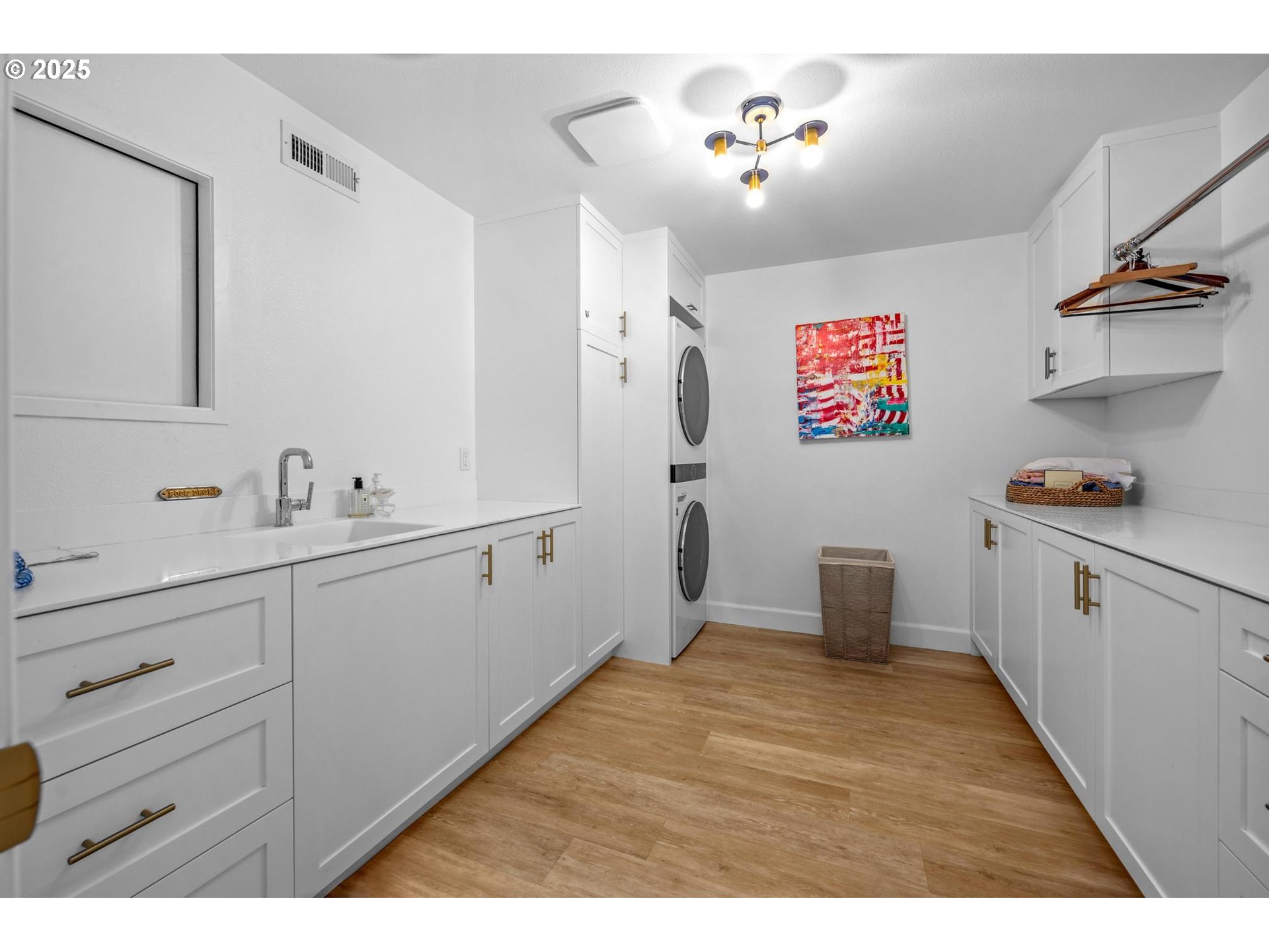 40 Southwest Condolea Court Lake Oswego, OR 97035 - Photo 30 of 39 a spacious bathroom with a sink a mirror and a shower