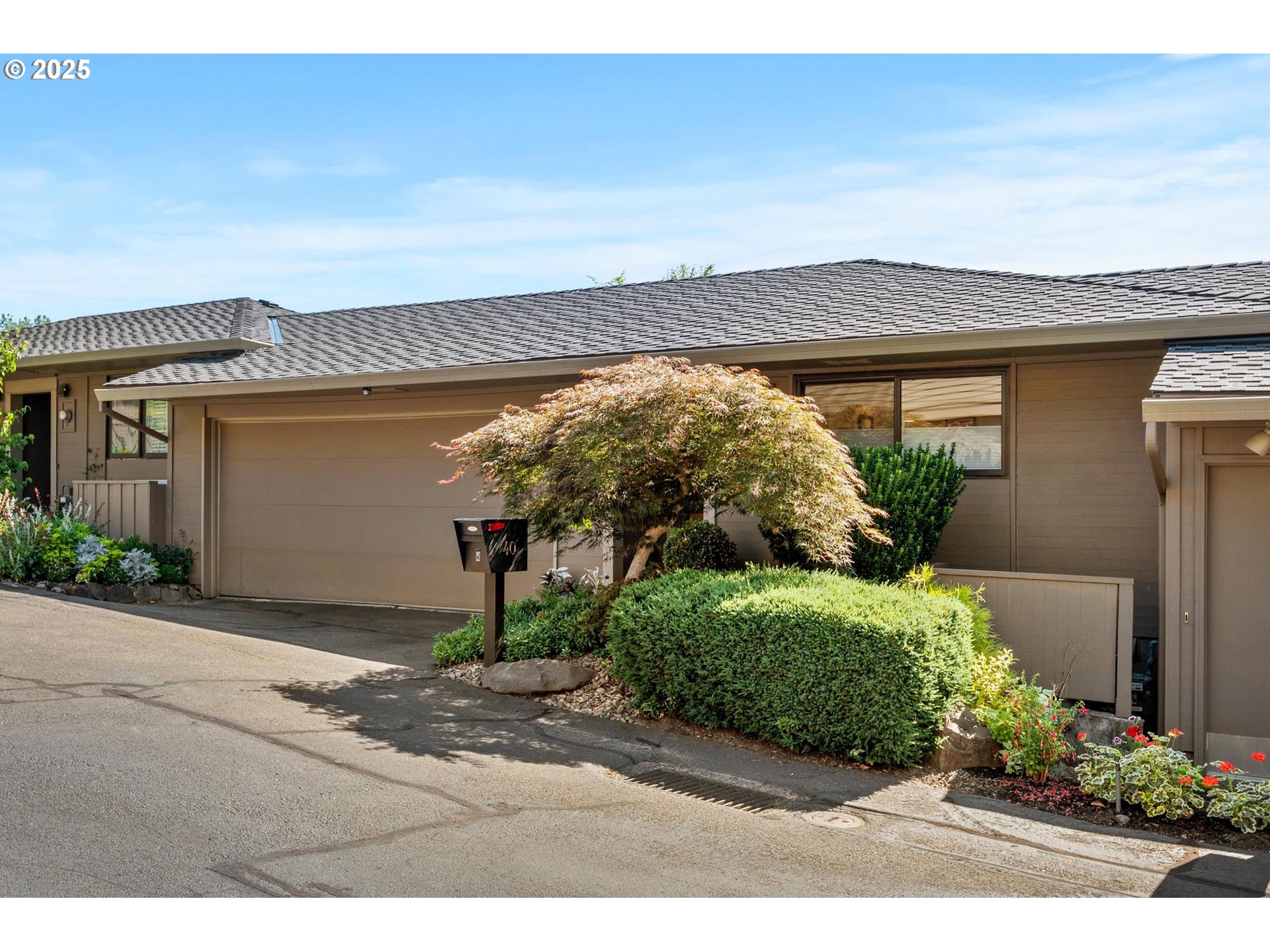 40 Southwest Condolea Court Lake Oswego, OR 97035 - Photo 35 of 39 front view of a house with a street