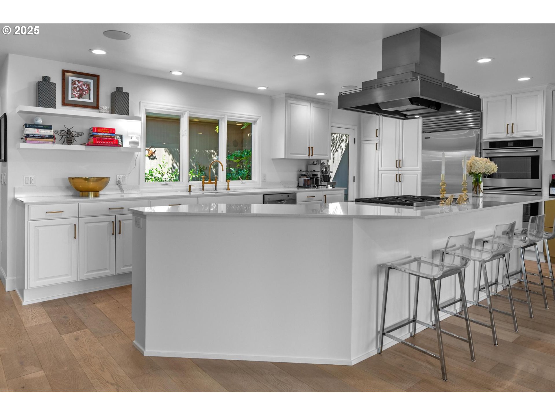 40 Southwest Condolea Court Lake Oswego, OR 97035 - Photo 6 of 39 a kitchen with stainless steel appliances granite countertop a sink and a refrigerator