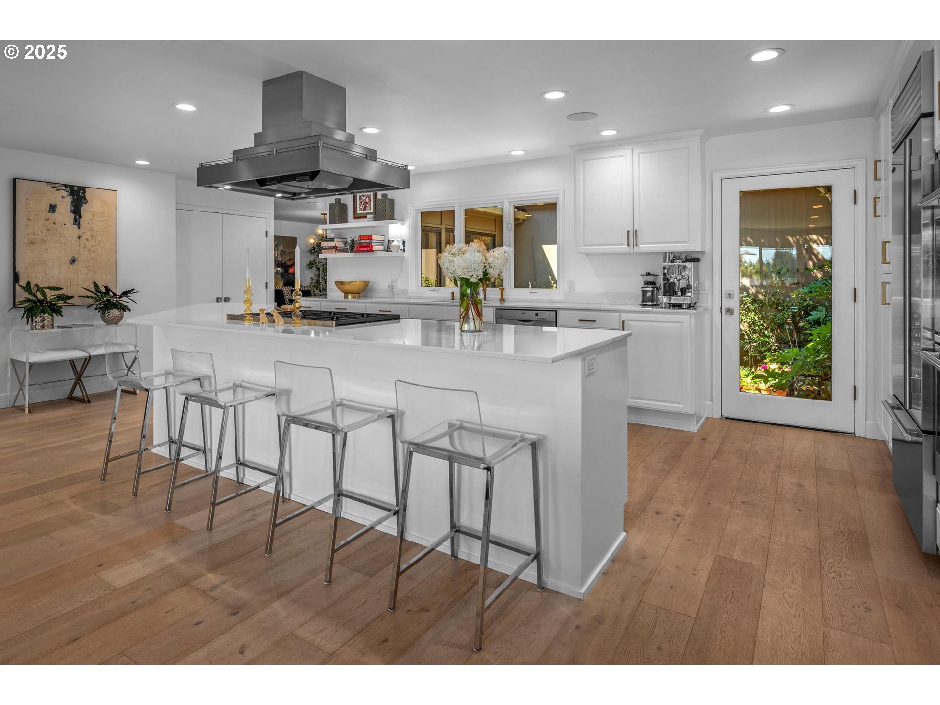 40 Southwest Condolea Court Lake Oswego, OR 97035 - Photo 9 of 39 a kitchen with stainless steel appliances kitchen island granite countertop a sink and cabinets