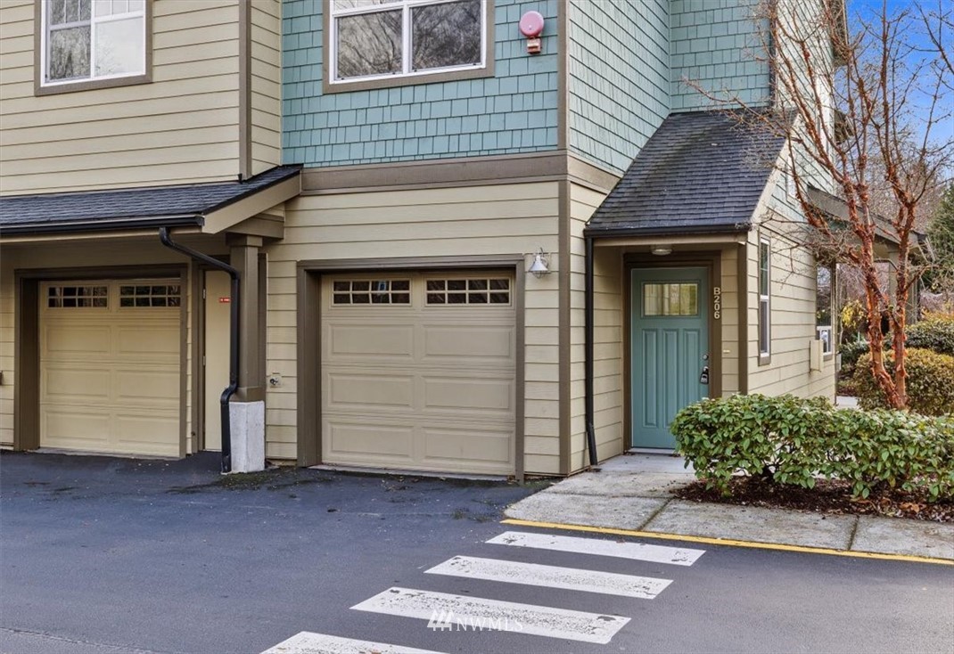 19102 20th Drive Southeast, Unit B206 Bothell, WA 98012 - Photo 2 of 29 a front view of a house