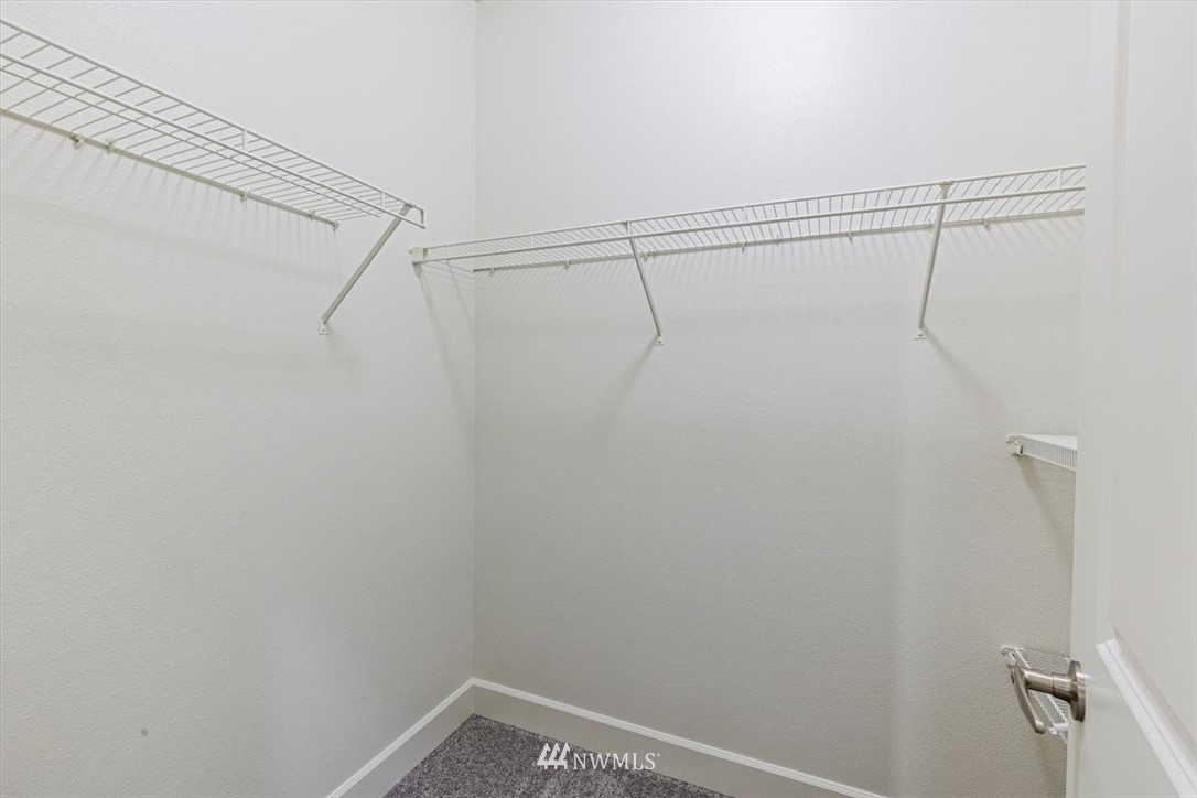 19102 20th Drive Southeast, Unit B206 Bothell, WA 98012 - Photo 20 of 29 a view of a room with racks on the wall