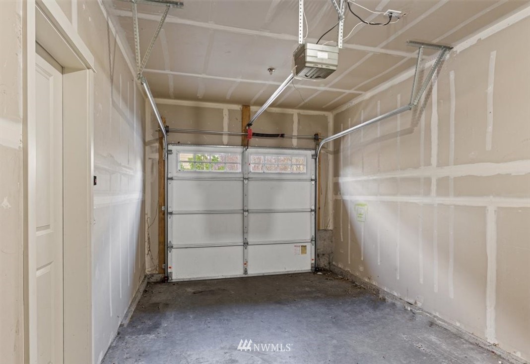 19102 20th Drive Southeast, Unit B206 Bothell, WA 98012 - Photo 25 of 29 a view of a room with racks on the wall